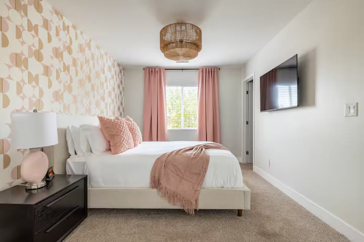 Stylish & Perfect for Families queen bedroom at a direct-booking vacation rental in Phoenix, Arizona