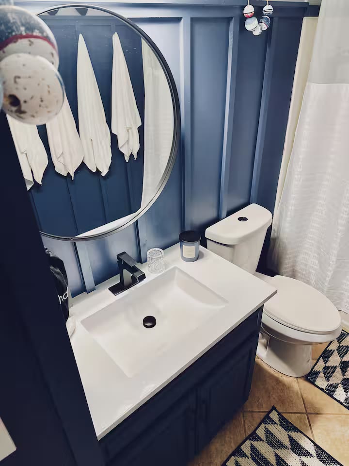 Weiss Lake House with Private Dock bathroom vanity at a direct-booking vacation rental in Cedar Bluff, Alabama