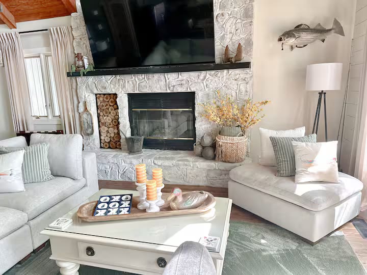 Weiss Lake House with Private Dock living room seating at a direct-booking vacation rental in Cedar Bluff, Alabama