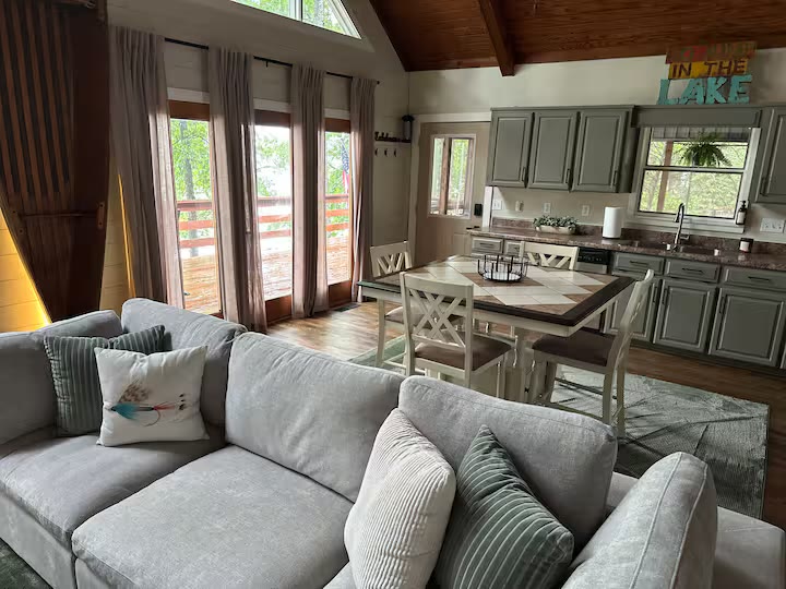 Weiss Lake House with Private Dock open living room at a direct-booking vacation rental in Cedar Bluff, Alabama