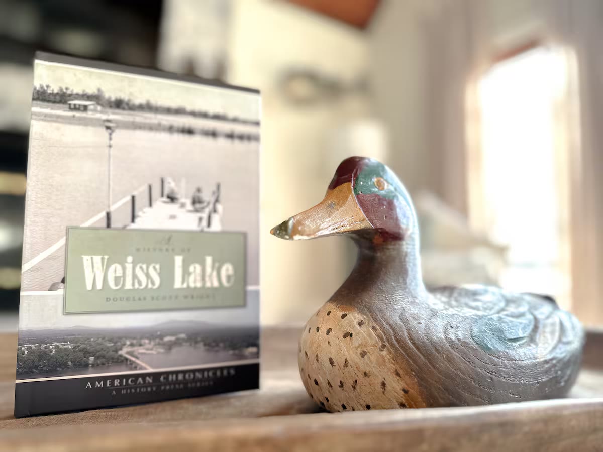 Weiss Lake House with Private Dock lake house sign at a direct-booking vacation rental in Cedar Bluff, Alabama