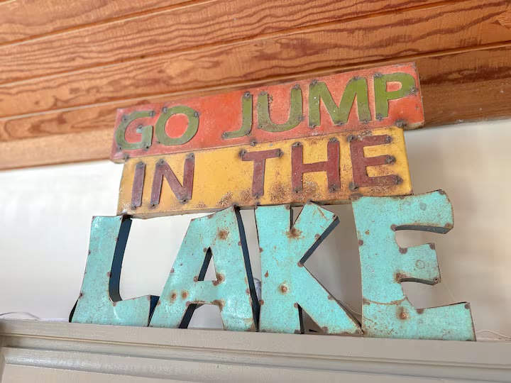 Weiss Lake House with Private Dock welcome decor at a direct-booking vacation rental in Cedar Bluff, Alabama