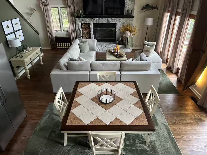 Weiss Lake House with Private Dock living room sofa at a direct-booking vacation rental in Cedar Bluff, Alabama